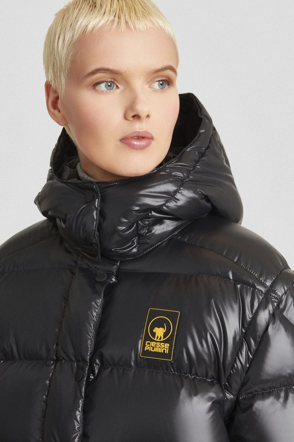 Piumino Ciesse trapuntato nero con cappuccio e maniche staccabili