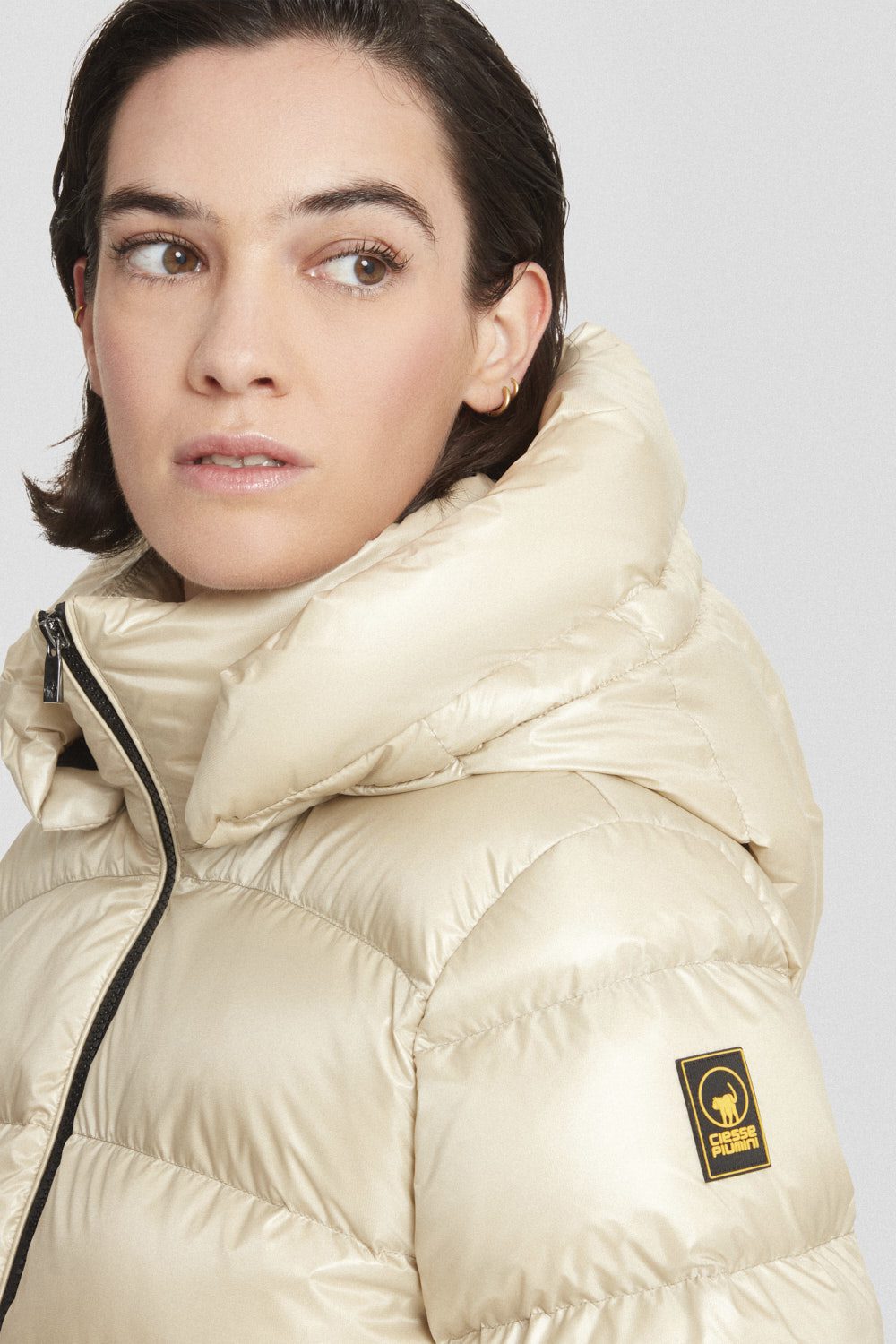 Piumino Ciesse medio-lungo beige con cappuccio staccabile