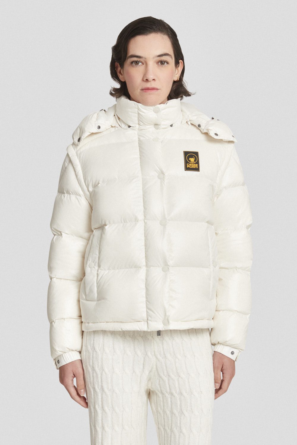 Piumino Ciesse trapuntato bianco con cappuccio e maniche staccabili